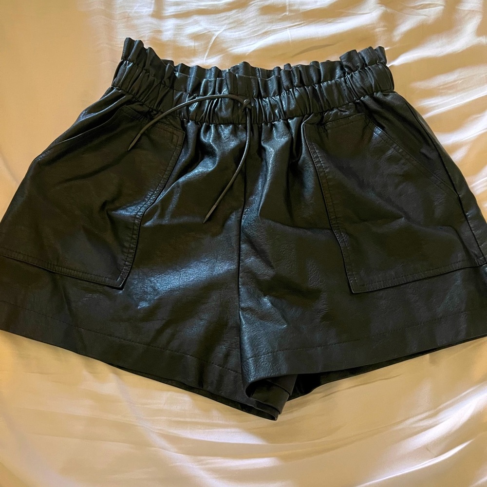 Black faux leather shorts